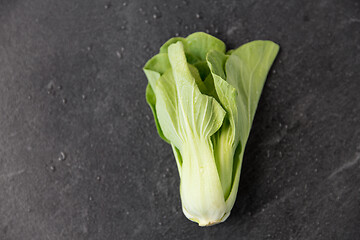 Image showing close up of bok choy cabbage on slate background