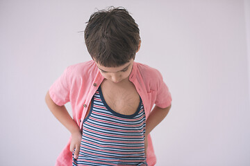 Image showing lilittle boy looking at heart love symbol sketched on his chest