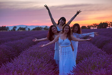 Image showing group of famales have fun in lavender flower field