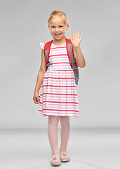 Image showing happy student girl with school bag waving hand