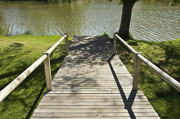 Image showing Wooden pathway in a natural park