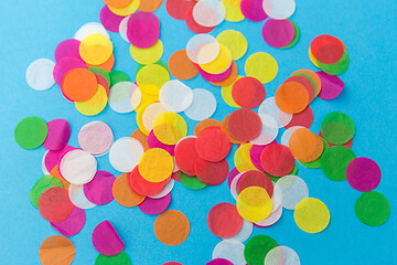 Image showing colorful confetti decoration on blue background