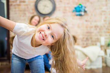 Image showing little girl fooling around in front of the camera