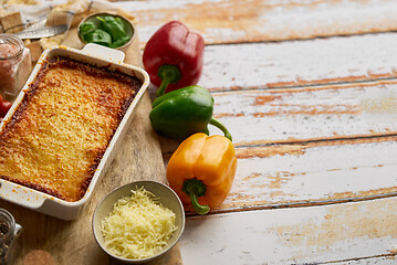 Image showing Delicious lasagne bolognese with pepper, tomato and cheese