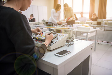 Image showing students doing practice in the electronic classroom