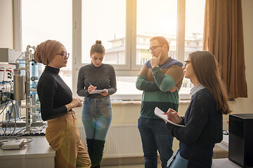 Image showing young students doing practice in the electronic classroom