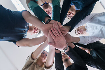 Image showing students celebrating successfully finished project