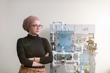 Image showing portrait of muslim female student in the electronic classroom