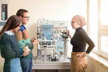 Image showing young students doing practice in the electronic classroom