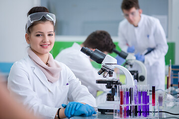 Image showing Group of young medical students doing research