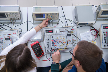 Image showing students doing practice in the electronic classroom top view