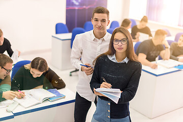 Image showing young students writing notes