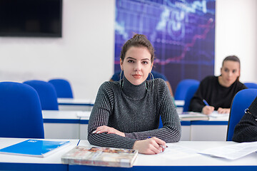 Image showing female student writing notes