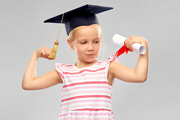 Image showing little girl in mortarboard with diploma