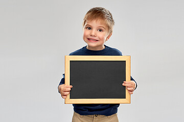 Image showing little boy holding black blank chalk board