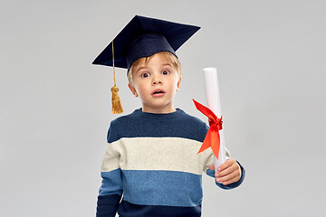 Image showing little boy in mortarboard with diploma