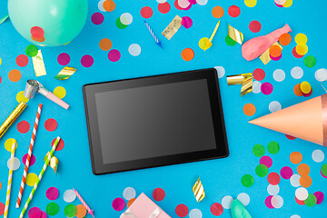 Image showing tablet computer, birthday gift and party props