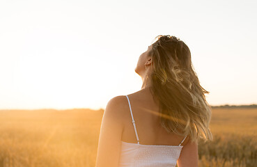 Image showing woman on cereal field in summer