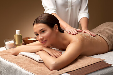 Image showing close up of woman lying and having massage in spa