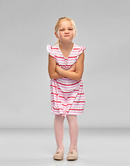 Image showing displeased little girl with crossed arms pouting