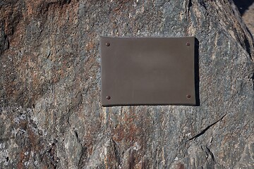 Image showing Memorial plate or information sigh on cliff surface