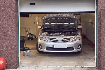 Image showing Car in a repair shop garage