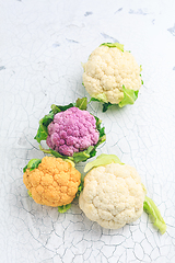 Image showing Organic colorful cauliflower on old kitchen table