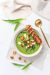 Image showing Ramson or bear leek soup with crouton, sour cream and turkey skewer