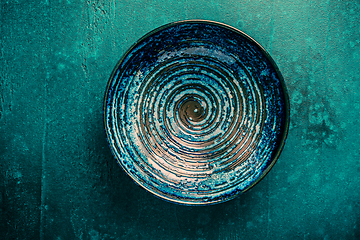 Image showing Pottery bowl or ceramics in green and blue tone