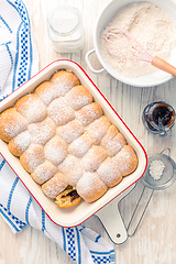 Image showing Sweet rolls, Buchteln filled with plum jam or jelly