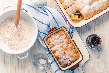 Image showing Sweet rolls, Buchteln filled with plum jam or jelly