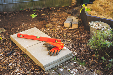 Image showing Building garden path or base in garden