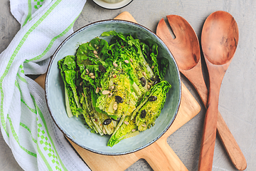 Image showing Lettuce salad with olive oil dressing