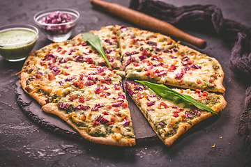 Image showing Tart flambee (Flammkuchen) with ramson sour cream, onion and bacon