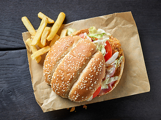 Image showing fresh tasty burger and fried potatoes