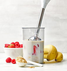 Image showing process of making healthy breakfast milkshake