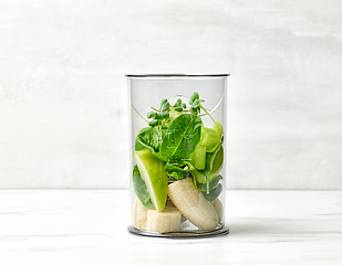 Image showing banana and various green vegetables in blender container