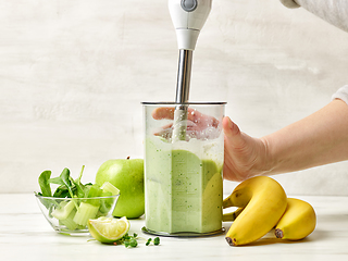 Image showing process of making healthy breakfast smoothie