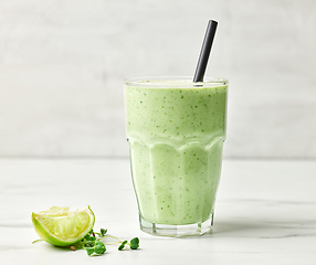 Image showing glass of green breakfast smoothie