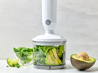 Image showing avocado, celery and spinach in plastic transparent blender conta