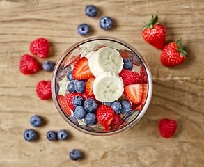 Image showing glass of fresh banana and berries