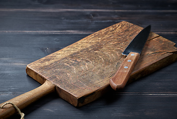 Image showing empty wooden cutting board and knife