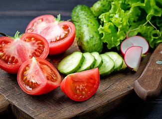 Image showing fresh vegetables on cutting board