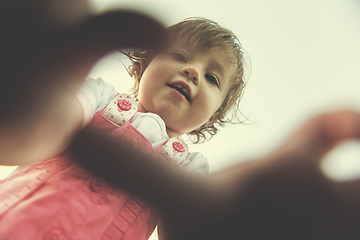 Image showing little girl spending time at backyard