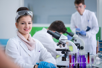 Image showing Group of young medical students doing research