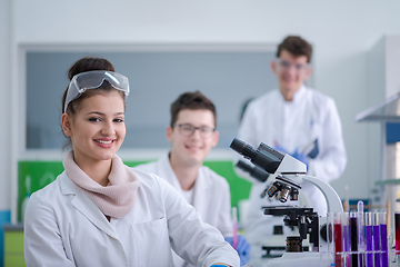 Image showing Group of young medical students doing research