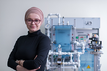 Image showing portrait of muslim female student in the electronic classroom