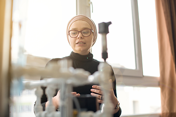 Image showing portrait of muslim female student in the electronic classroom