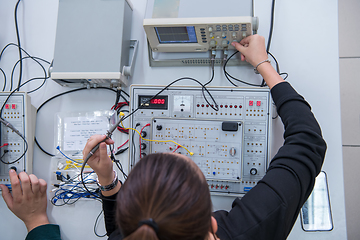 Image showing students doing practice in the electronic classroom top view