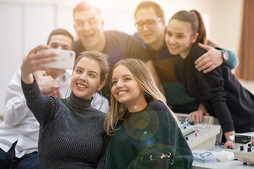 Image showing young happy students doing selfie picture